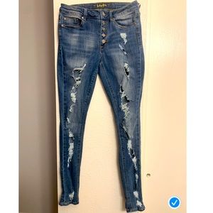 High rise super distressed skinny jeans size 27